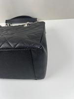 Sac cabas Chanel en cuir grainé noir - Photo 9