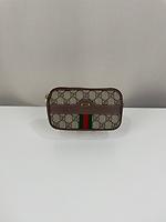 Sac ceinture Gucci en toile GG - Photo 5