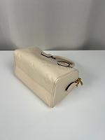 Sac Louis Vuitton Speedy 20 en cuir empreinte beige avec bandoulière - Photo 9