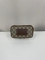 Sac ceinture Gucci en toile GG - Photo 6