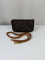 Sac pochette accessoire monogram Louis Vuitton - Photo 1