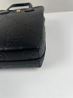 Sac cabas vertical Gucci en cuir noir - Photo 10