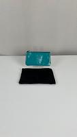 Pochette à clés / portemonnaie Saint Laurent en cuir verni turquoise - Photo 1