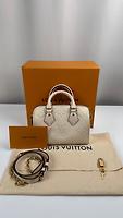 Sac Louis Vuitton Speedy 20 en cuir empreinte beige avec bandoulière - Photo 4