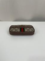 Sac ceinture Gucci en toile GG - Photo 7