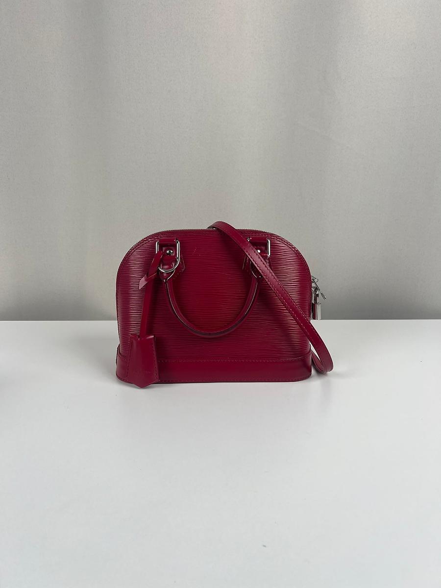 Sac bandoulière Alma BB Louis Vuitton en cuir épi framboise