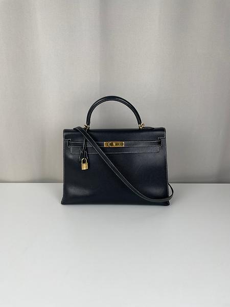 Hermès Kelly 35 cuir noir bijouterie dorée