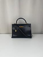 Hermès Kelly 35 cuir noir bijouterie dorée - Photo 1