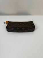 Sac pochette accessoire monogram Louis Vuitton - Photo 7