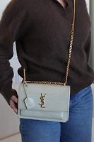 Sac bandoulière Sunset Saint Laurent en cuir beige embossé - Photo 3