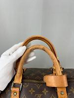 Sac de voyage Keepall 55 Louis Vuitton en toile monogram avec bandoulière - Photo 10